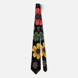 Djärkt gul, röd och grön blomster på svart slips