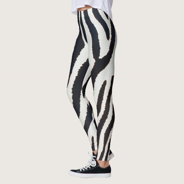 Djurets svarta och vita zebrastrimlade stil leggings (Vänster)