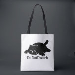 Do Not Disturb Black Cat Tote Bag Cute Lazy Cat Tygkasse<br><div class="desc">Do Not Disturb: For those days when you just want to be left alone… this cute black cat tote bag says it all. Featuring a minimalist lazy cat illustration paired with the bold phrase “Do Not Disturb, ” this tote is perfect for introverts, cat lovers, students, and anyone who enjoys...</div>