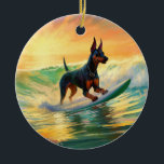 Doberman Beach Surfing Painting Julgransprydnad Keramik<br><div class="desc">Lägg dig i den lekande världen i hund äventyr med den här fängslande målningen. En andlig hund tar sig till vågar och kör skickligt surfan på en strand som kysstes av sol. Den sjudande konsten fångar på ett vackert sätt kärnan i den upphetsning som finns vid sidan av när hund...</div>