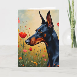 Doberman i fält om blommor kort
