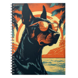 Doberman vid en tropisk strand under solnedgången anteckningsbok
