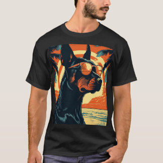 Doberman vid en tropisk strand under solnedgången t shirt