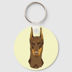 Dobermanhuvud som är rött nyckelring