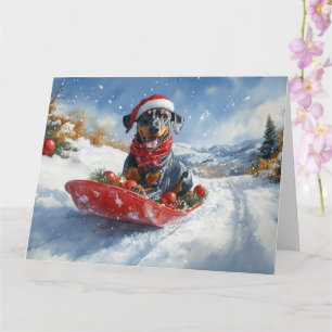 Dobermann hund i släde Låt det snöa jul Kort