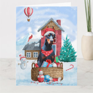 Dobermannhund i snö Jul Hund Hus Kort