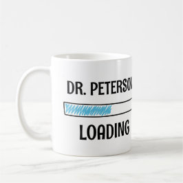 Doktor läser in kaffemugg