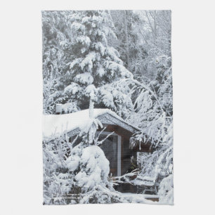 Dold stuga för snö i trädgårdarna kökshandduk