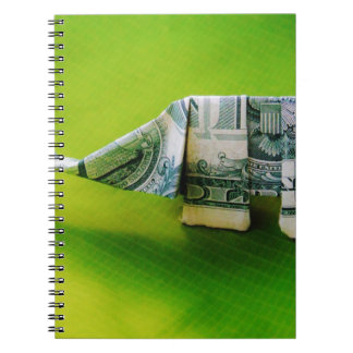 Dollar bill origami Elephant på Gröntens bakgrund Anteckningsbok