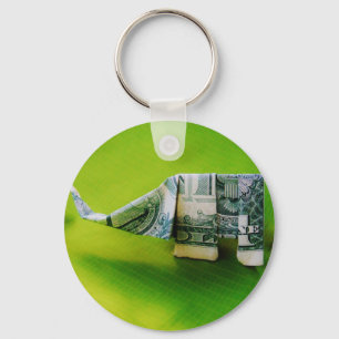 Dollar bill origami Elephant på Gröntens bakgrund Nyckelring