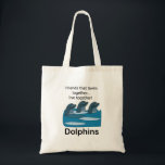 Dolphins Aquatic Animal Friendship  Tygkasse<br><div class="desc">Dolphins Aquatic Animal Friendship Tote Bag originally designed by Nisha Prabhu. The Dolphins Aquatic Animal Friendship Tote Bag features a delightful and eye-catching design celebrating the playful spirit of dolphins and marine life. This spacious tote showcases vibrant illustrations of dolphins swimming gracefully through sparkling waves, symbolizing friendship and harmony with...</div>