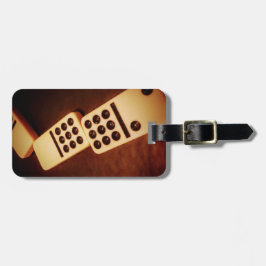 Domino-effektens stopptagg bagagebricka