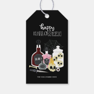 Döskallar och positioneringar i Happy halloween Presentetikett