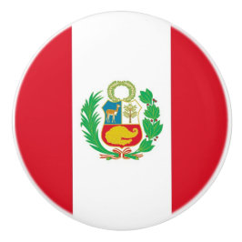 Drag av keramiskt knapp med flagga av Peru Knopp