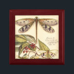 Dragonflugor med Löv och frukt Minnesask<br><div class="desc">Dragonflugor flyter ovanför löv och bär frukt i biet av Vision Studio. Den insektra trion blandar häpnadsväckande väl med sin bakgrund och ge den här utskriften till en verklighetstrogen kvalitet. Beställ ditt exemplar idag!</div>