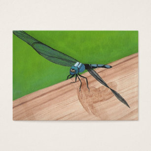Dragonfly på ett kort för handel med järnvägsa