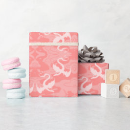Drakar över rosa presentpapper