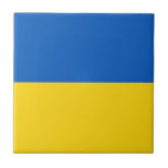 Drapeau Ukraine Kakelplatta<br><div class="desc">Drapeau de l'Ukraine: Les couleurs sont associées au paysage ukrainien,  les bandes horizontales bleue et jaune symbolisent le ciel bleu sur les champs de blé.</div>