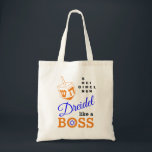Dreidel like A Chef Hanukkah Tygkasse<br><div class="desc">Snyggt DREIDEL LIKSOM EN CHEF Hanukkah Tote Bag designad med orange dreidel och blue, orange och svart typografi. I det övre handhörnet på högerna kan du läsa namn på de fyra modellsidorna i ett ord-pussel (HEI kan ändras till HEY eller HAY om det behövs). Inuti O i CHEF är en...</div>