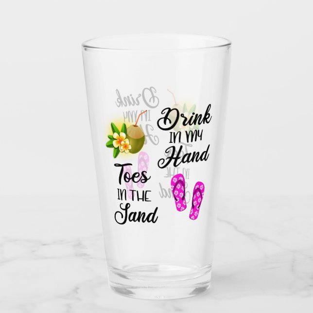 Drick i handen, tårna i sanden glaskopp (Framsida)