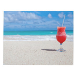 Drick på anteckningsblock i Beach