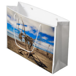 Driftwood-grafik på Hokitika Beach, Nya Zeeland