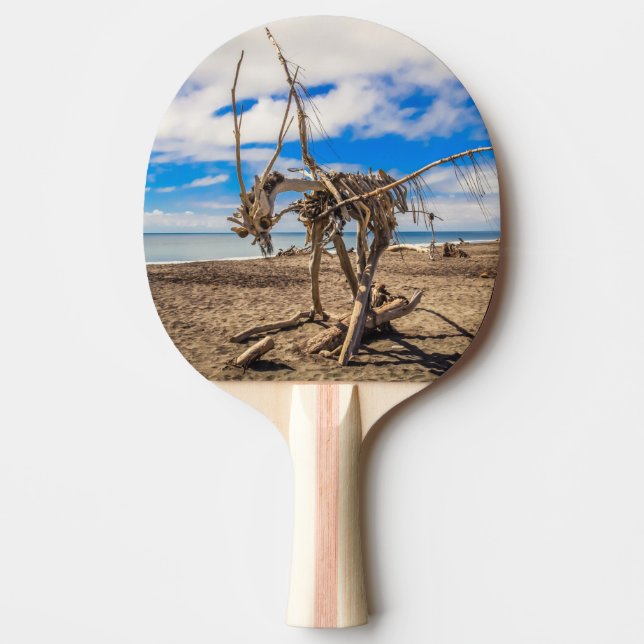 Driftwood-grafik på Hokitika Beach, Nya Zeeland Pingisracket (Framsidan)