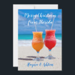 Drinkar på Beach Florida-julklapp i Hälsning Julkort<br><div class="desc">Tropiska drycker på stranden Jul/Julhälsningar kort att skicka från ett par. Två slussar,  frysta cocktails i rött och orange sitter på sanden med tropiska turkoshavet som bakgrund för anpassningsbar hälsning och namnteckning. Reverse har också en bigård.</div>
