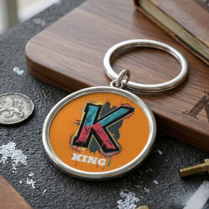 Dripping K: Djärv, enbokstavsgraffiti som kan anpa Rund Silverfärgad Nyckelring