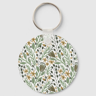 drömmande blommönster nyckelring