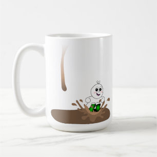 Droppandegrabb som plaskar i kaffepöl kaffemugg