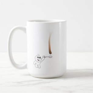 Droppandegrabben som fångar kaffe, tappar med en kaffemugg