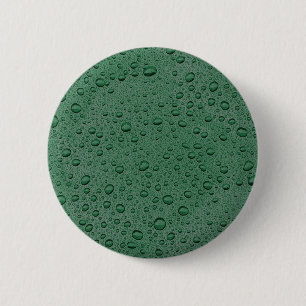 Droppar av grönt vatten knapp