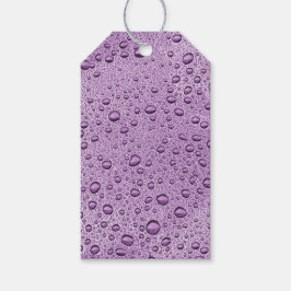 Droppar av lila vatten presentetikett