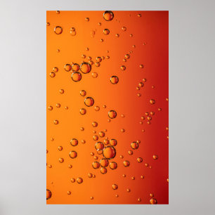 droppar i vatten på orange yta poster