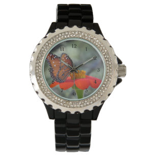 Drottningfjäril på den mexicanska solrosen armbandsur
