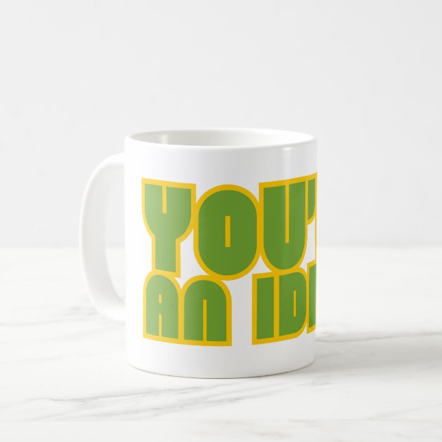 DU ÄR EN IDIOT Lustig Sarkastisk Kaffemugg (Framsida vänster)