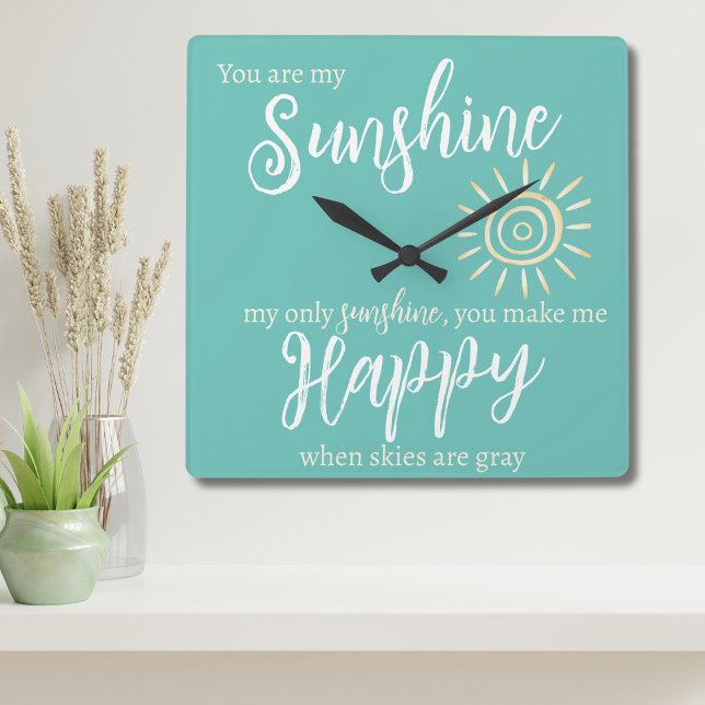 Du är min solsken, gör mig Lycklig blå med Sol Fyrkantig Klocka (Sunshine You Make Me Happy wall clock reminds her that you care! Bright teal with pale yellow sun.)