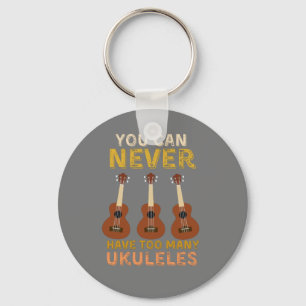 Du kan aldrig ha för många ukuleles-spelare nyckelring