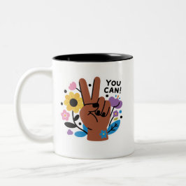 Du kan blommig fredstecken tvåtons kaffekopp