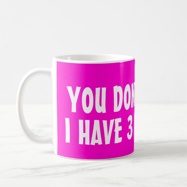 Du skrämmer mig inte jag har 3 döttrar kaffemugg (Vänster)