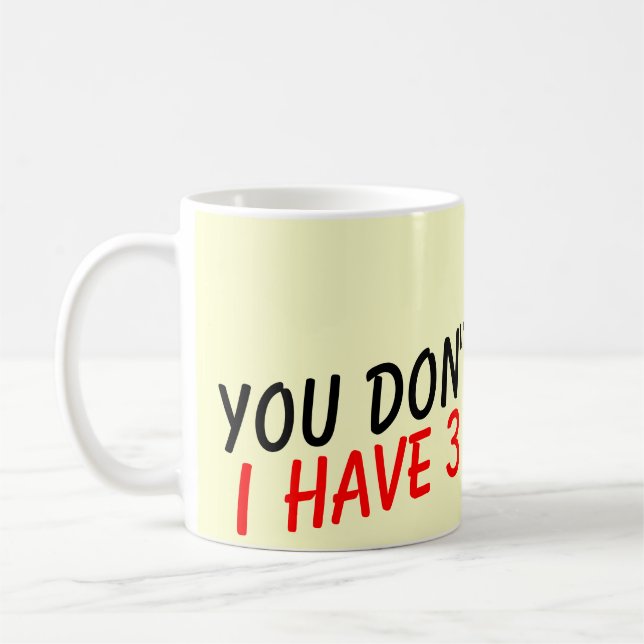 Du skrämmer mig inte jag har 3 döttrar kaffemugg (Vänster)