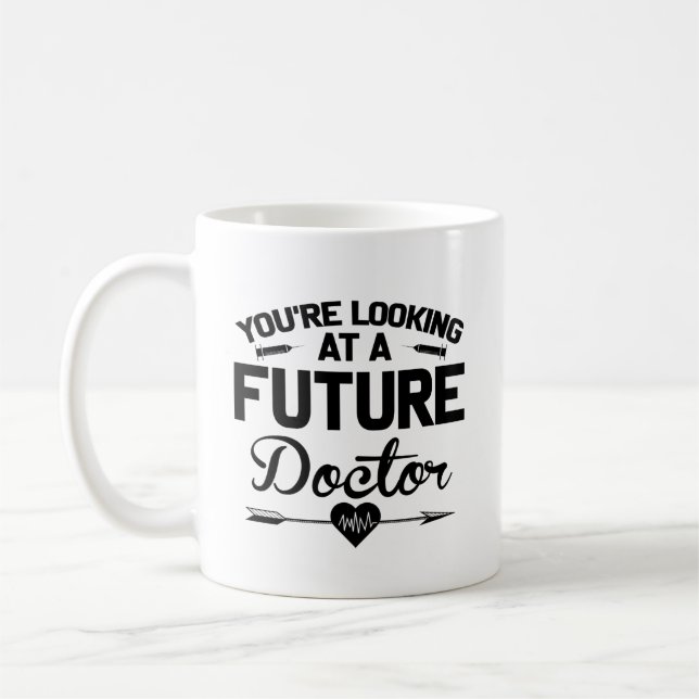 Du Tittar vid en framtida Doktor-Studenten Kaffemugg (Vänster)