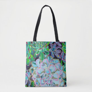 Dual-sided tote bag featuring a succulent bouquet tygkasse
