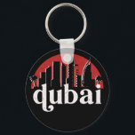 Dubai UAE Vintage Retro City Skyline Cityscape Art Nyckelring<br><div class="desc">Vintage- och reflexritorier med vackra skyliner, attraktion och cityscape-konst. Coola skyscraper och byggnad silhuette illustrerar handelsvara för turister och resenärer. Perfekt som souvenir att ta med sig hem när man reser värld runt. Spara minnet av din resa och semester med familj och vänner. Bakgrunden till färg kan anpassas till färg....</div>
