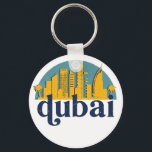 Dubai UAE Vintage Retro City Skyline Cityscape Art Nyckelring<br><div class="desc">Vintage- och reflexritorier med vackra skyliner, attraktion och cityscape-konst. Coola skyscraper och byggnad silhuette illustrerar handelsvara för turister och resenärer. Perfekt som souvenir att ta med sig hem när man reser värld runt. Spara minnet av din resa och semester med familj och vänner. Bakgrunden till färg kan anpassas till färg....</div>