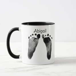 Dubbla fotavtryck i Baby Mugg