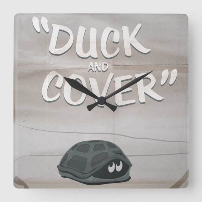 Duck & Cover Fyrkantig Klocka (Framsida)
