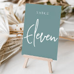 Dusty Teal Hand Scripted Bord ELVA Bordsnummer<br><div class="desc">Enkla kort för bordsnummer och chic i dammig teal aqua och vit gör en elegant påstående vid din bröllop eller händelse. Designfunktionerna "bord [nummer]" i en ögonetsande blandning av klassisk serif och handskriven skriptskrift. Utformningen upprepas på båda sidor. Individuellt numrerade kort som säljs separat. Beställ varje bordsnummer var för sig...</div>