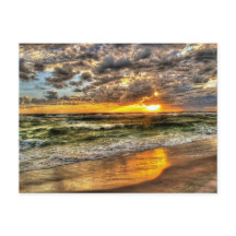 Dynamisk solnedgång vid Pensacola Beach, Florida